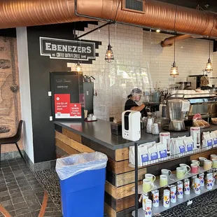 a man working in a coffee shop