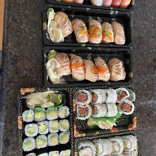 Omakase, salmon aburi, spicy tuna roll, California roll and avocado roll. All delicious!