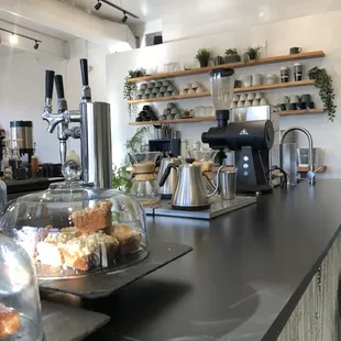 a counter with a variety of pastries