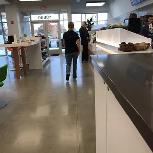 a man walking through a store