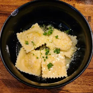 a bowl of ravioli