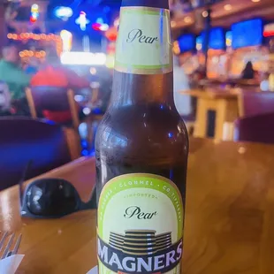 a bottle of beer on a table