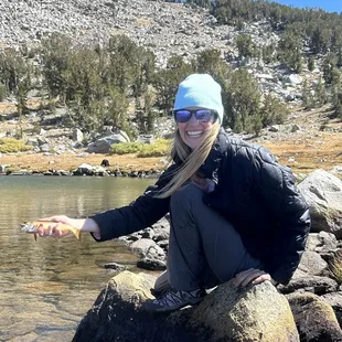 You can see the bear behind me at the edge of the water!