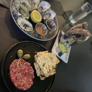 Half a dozen of oysters, portobello mushrooms and beef tare tare