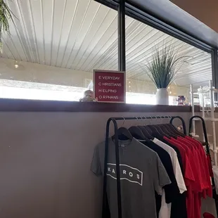 a rack of t - shirts