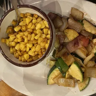 a bowl of corn and vegetables