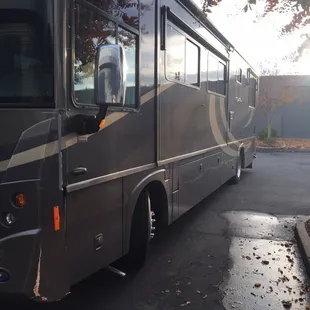 Pic:Damaged front cap and damage along the full length of the RV.