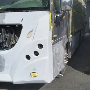 Damaged area repaired and primered. Ready for paint.