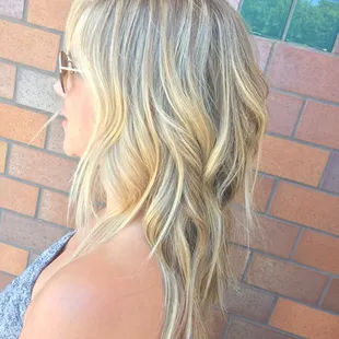 Long textured cut and stunning blonde by Cyndi. You can reach Cyndi directly at 1-916-505-8118