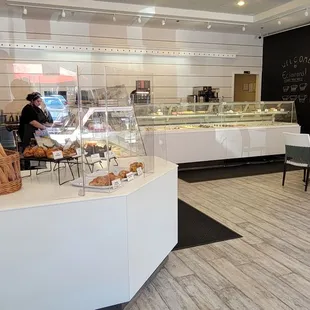 A view of all the display cases. The restrooms are down a short hallway through the doorway ahead.