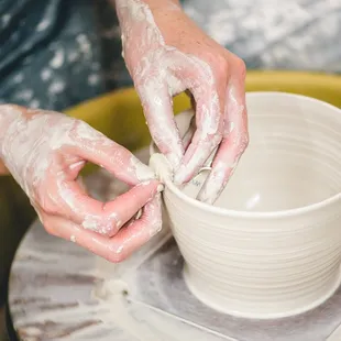 Gray Mountain Clay hand spins her pottery in Manitou Springs.