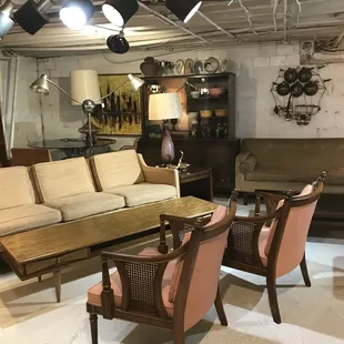 This is the mid century mod scene that greats you when you go downstairs... it's crazy what's in this basement!