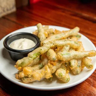 a plate of fried green beans