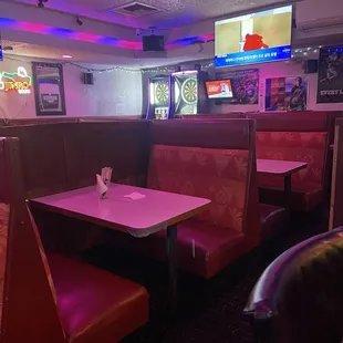 Booths, 2 dartboards, and TV screen