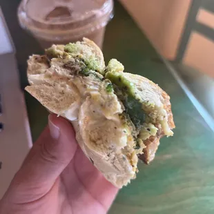 Egg avocado cream cheese on a jalapeño bagel