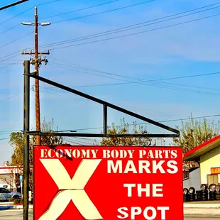 TWO businesses with &quot;Economy&quot; in the name close together on same street- the Auto Glass place w/ the great reviews has this sign in front...