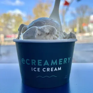 Two flavors in a small cup and a view.