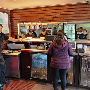 The window to the kitchen and friendly staff