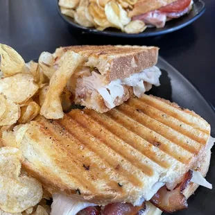 Paninis. Italian in the back and turkey, bacon, Gouda in front.