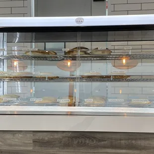 The display case full of empanadas