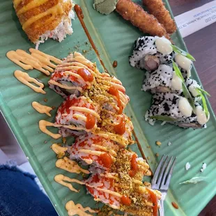 Calamari Strips Crab Cakes Crab Daddy Roll  Red Devil Roll