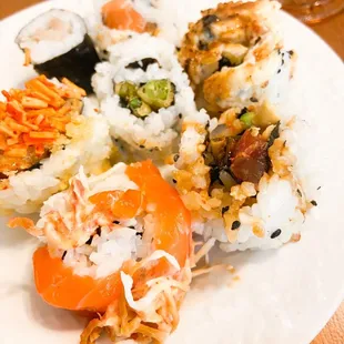 An assortment of sushi with friends