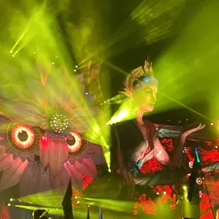 a woman performing on stage