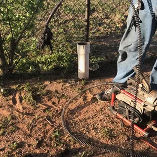 Unstopping sewer line after hours