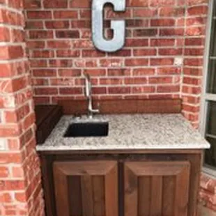 Install plumbing for outdoor hand wash sink