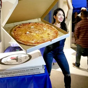 I&apos;m 5&apos;4&quot;, normal sized chick next to HUGE pizza! So heavy. Delicious.