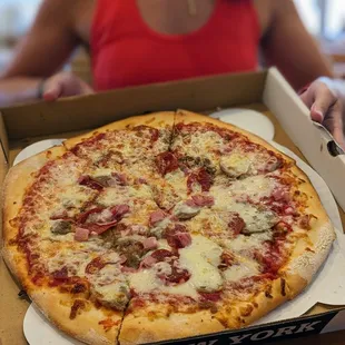 14 inch meat lovers pizza $18