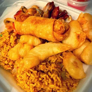 Fried rice with sweet and sour chicken, mushrooms and egg roll