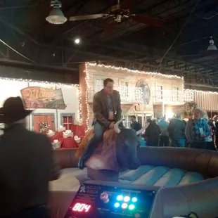 Mechanical bull riding