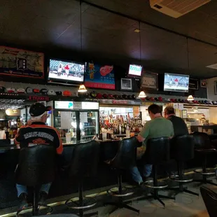 people sitting at the bar