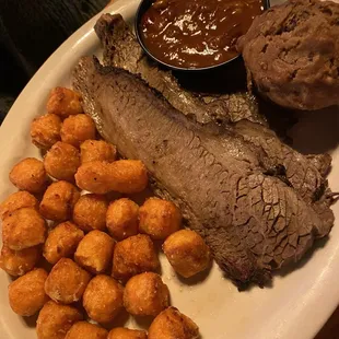 Brisket platter with sweet potato tots and pit beans
