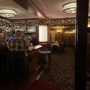 people sitting at the bar