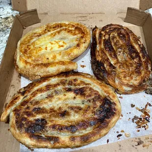 Two meat pies and one cheese pie to go. We could not eat one more bite in the restaurant so we got the pies to go.