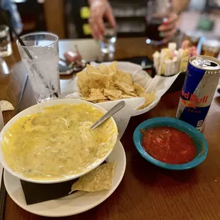 This is the loaded queso ( sc, ground beef &amp; quac) and a side of salsa!!! Definitely a 8/10 and the salsa is a 10/10 if you like spicy