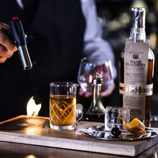 Experience our Smoked Old Fashioned, featuring Basil Hayden&apos;s Kentucky Bourbon.