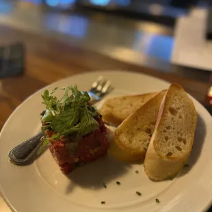 $10 BLACK TRUFFLE TARTARE Hand-Chopped Filet Mignon, Grana Padano with Toasted Baguettes (200 cal) (HH)