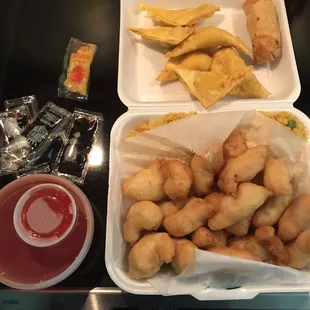 Sweet and Sour Chicken with Fried Rice, egg roll and crab rangoon. Lots of food for just one to eat. Price just over $11.00 - I recommend