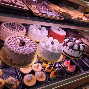 a display of cakes and pastries
