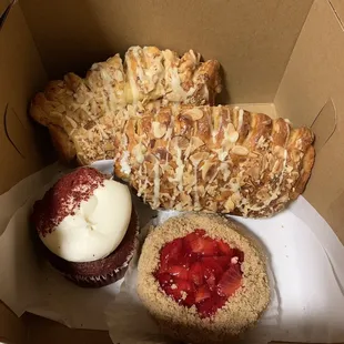 There's always something good in a box from Eddie's! Today it's bear claws, strawberry pizza and a red velvet cupcake!