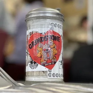 a can of coffee on a table