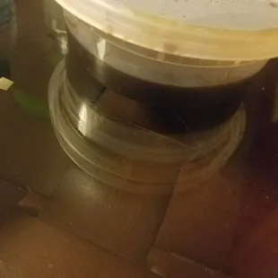 The sauce that should have been in the container with my dish...instead you have to pay extra to get any type of sauce!