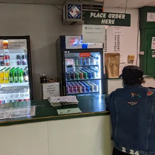 a man standing at the counter