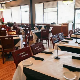 Alternative view of dining area floor, with front door in view