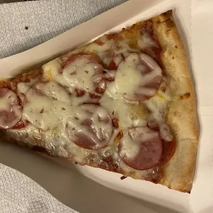 Slice of Cheese Pizza w/ pepperoni and Canadian bacons