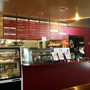 the counter and menus of the restaurant