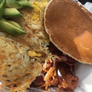 Hot breakfast platter with avocado  on the side ... yummm